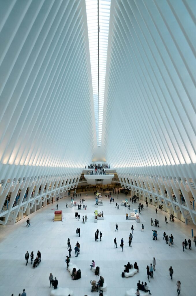pexels-photo-1770808-1770808 Modern architectural view of the Oculus in NYC, showcasing its futuristic design and bustling interior.